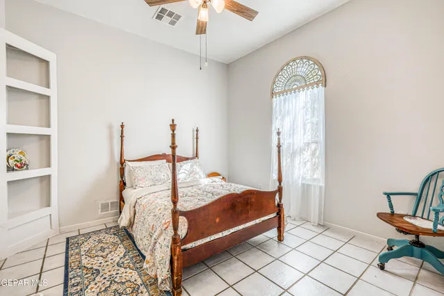 a aerial view of a house with porch yard and outdoor seating