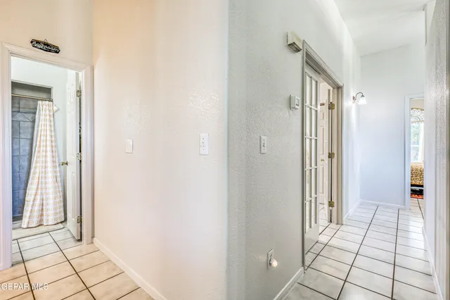 a aerial view of a house with table and chairs