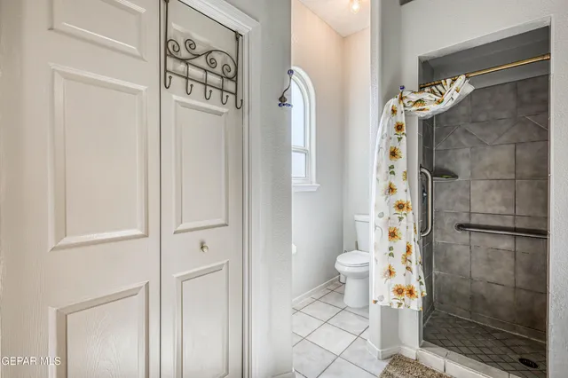 a view of a house with a yard and swimming pool