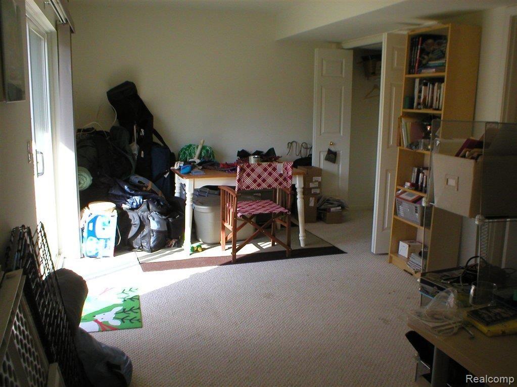 702 Cherry Orchard Road, Unit 158 Canton, MI 48188 - Photo 9 of 19 Family room lower level.JPG