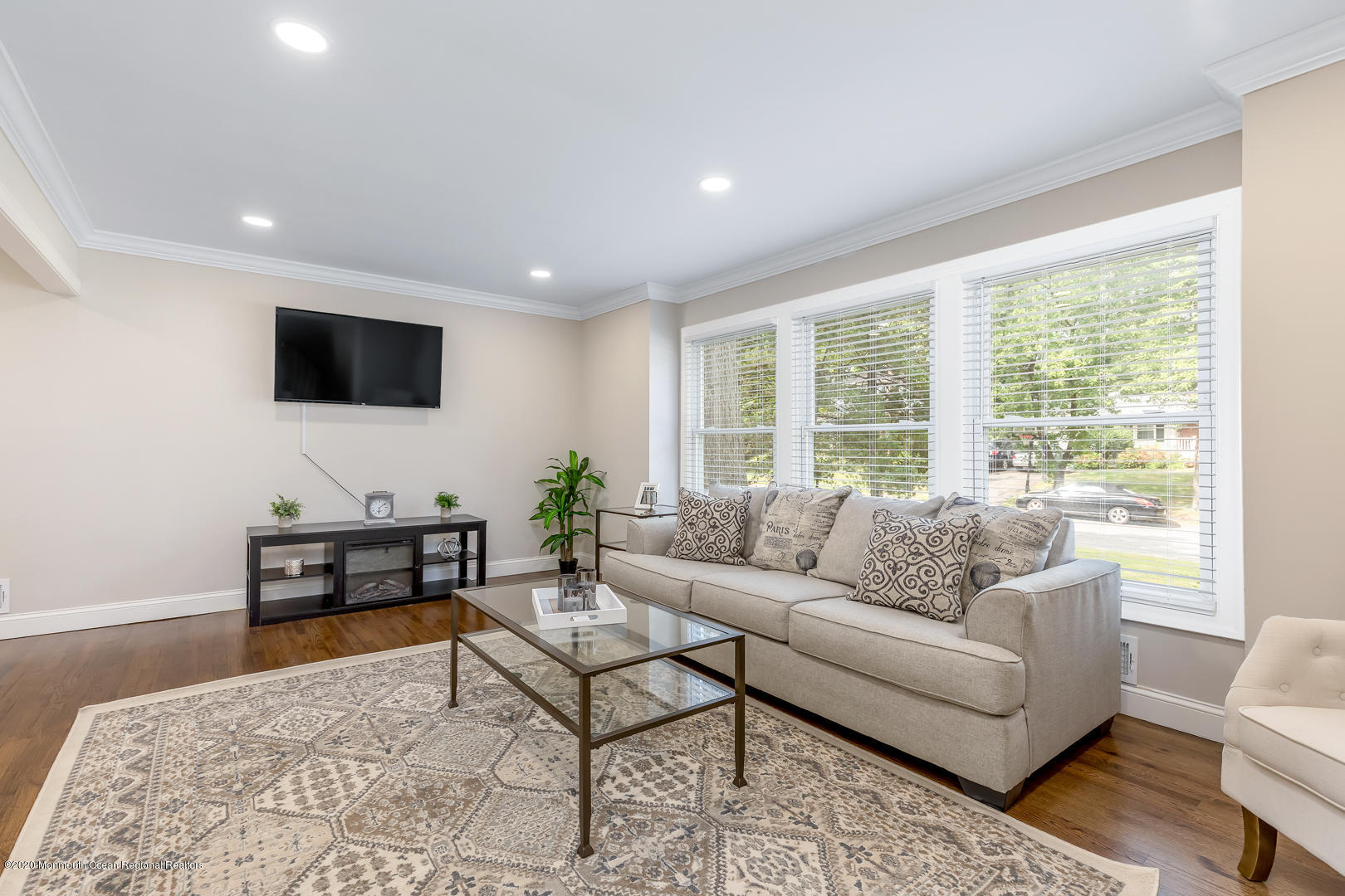 74 Pineland Road Brick, NJ 08724 - Photo 3 of 38 a living room with furniture and a flat screen tv