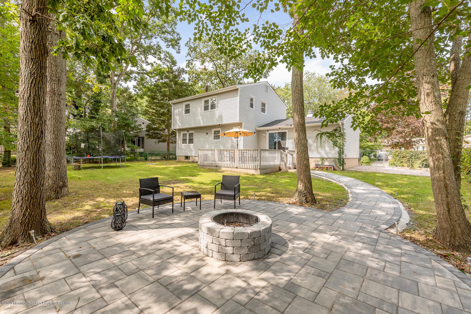 74 Pineland Road Brick, NJ 08724 - Photo 28 of 38 a view of a swimming pool with a patio