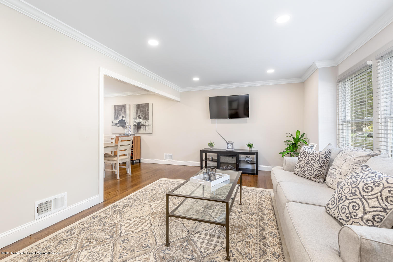 74 Pineland Road Brick, NJ 08724 - Photo 4 of 38 a living room with furniture and a flat screen tv
