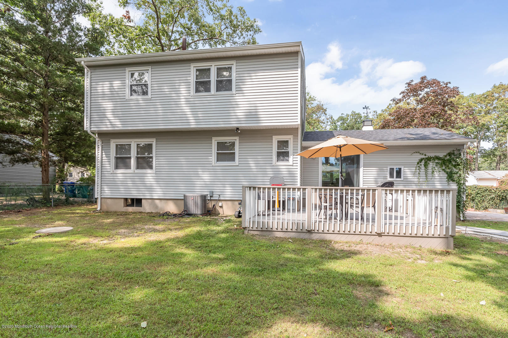 74 Pineland Road Brick, NJ 08724 - Photo 33 of 38 a view of a house with a yard and deck