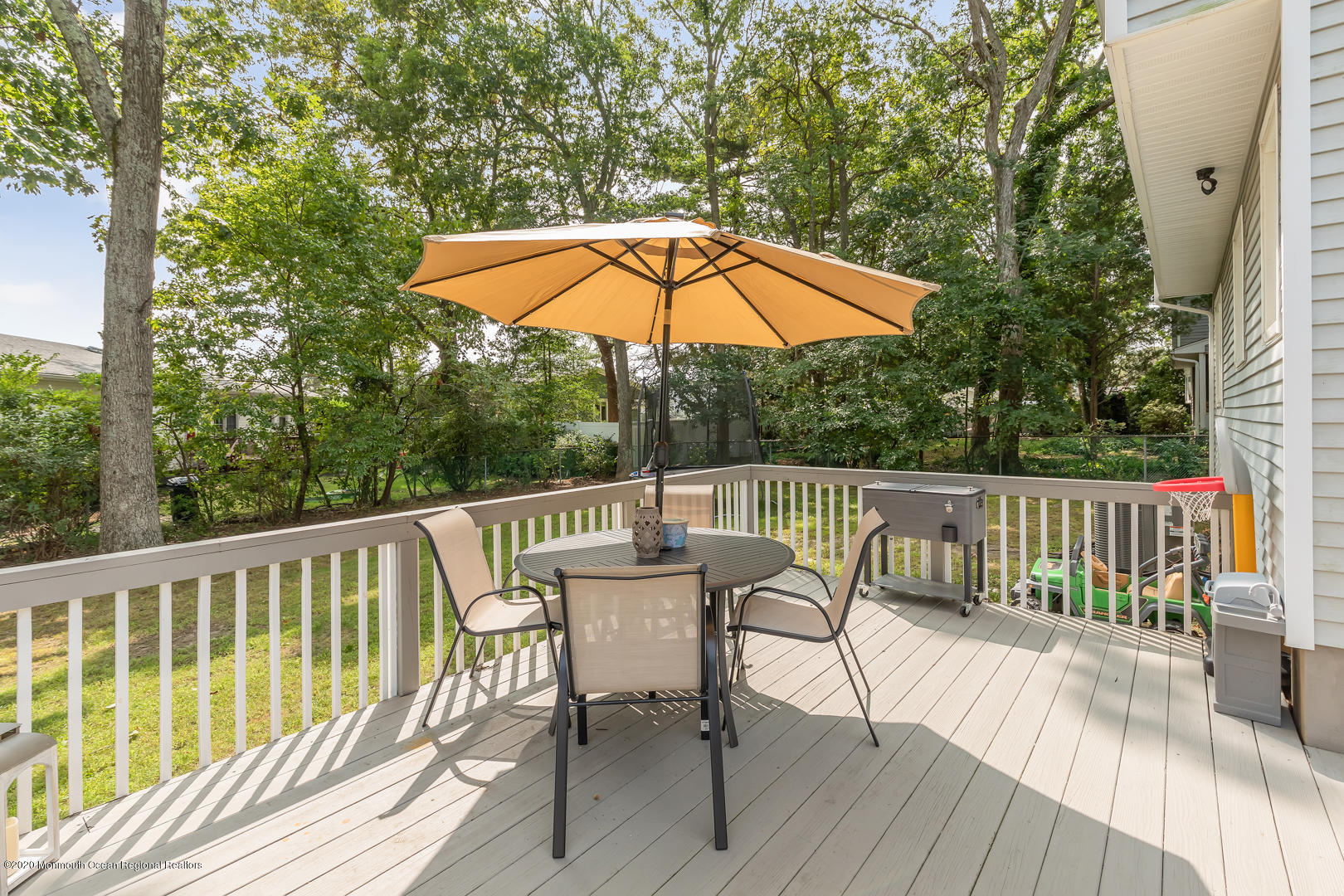 74 Pineland Road Brick, NJ 08724 - Photo 36 of 38 a view of balcony with furniture and umbrella