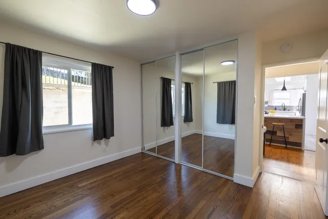 a view of entryway with wooden floor