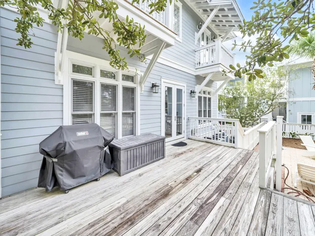 a front view of a house with seating space