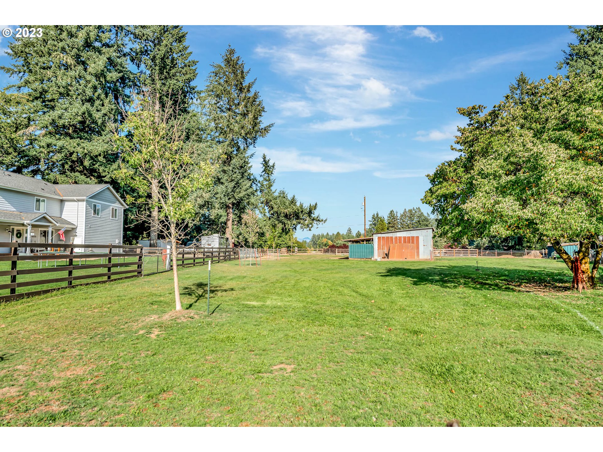 88750 Potter Lane Springfield, OR 97478 - Photo 36 of 43 a backyard of a house with lots of green space