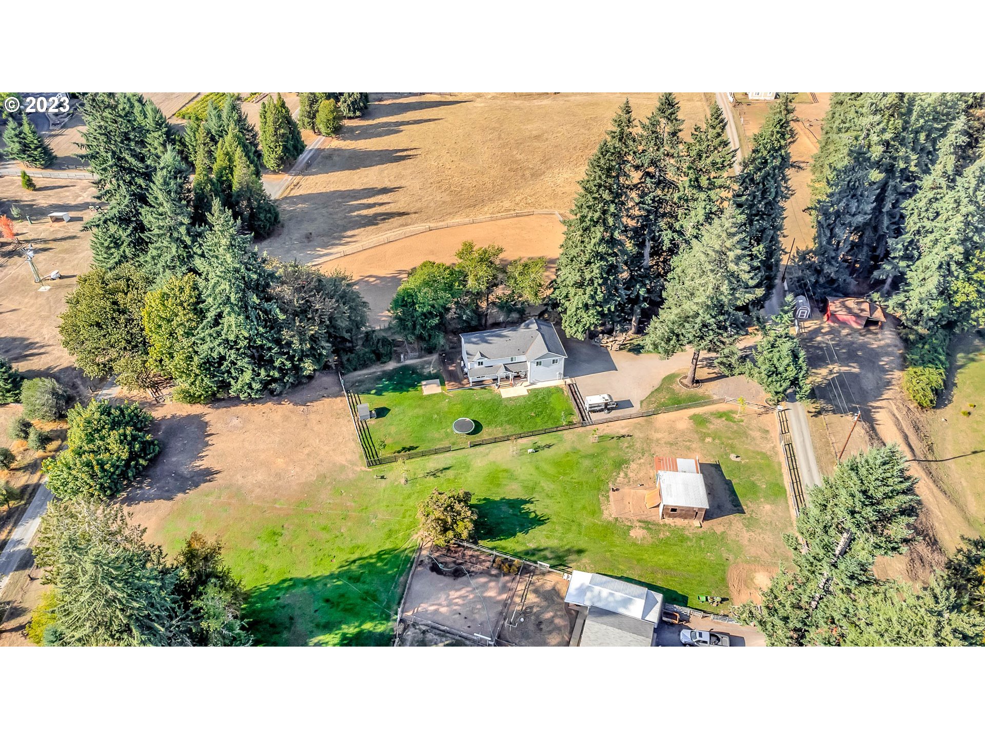 88750 Potter Lane Springfield, OR 97478 - Photo 43 of 43 a view of a swimming pool with a yard