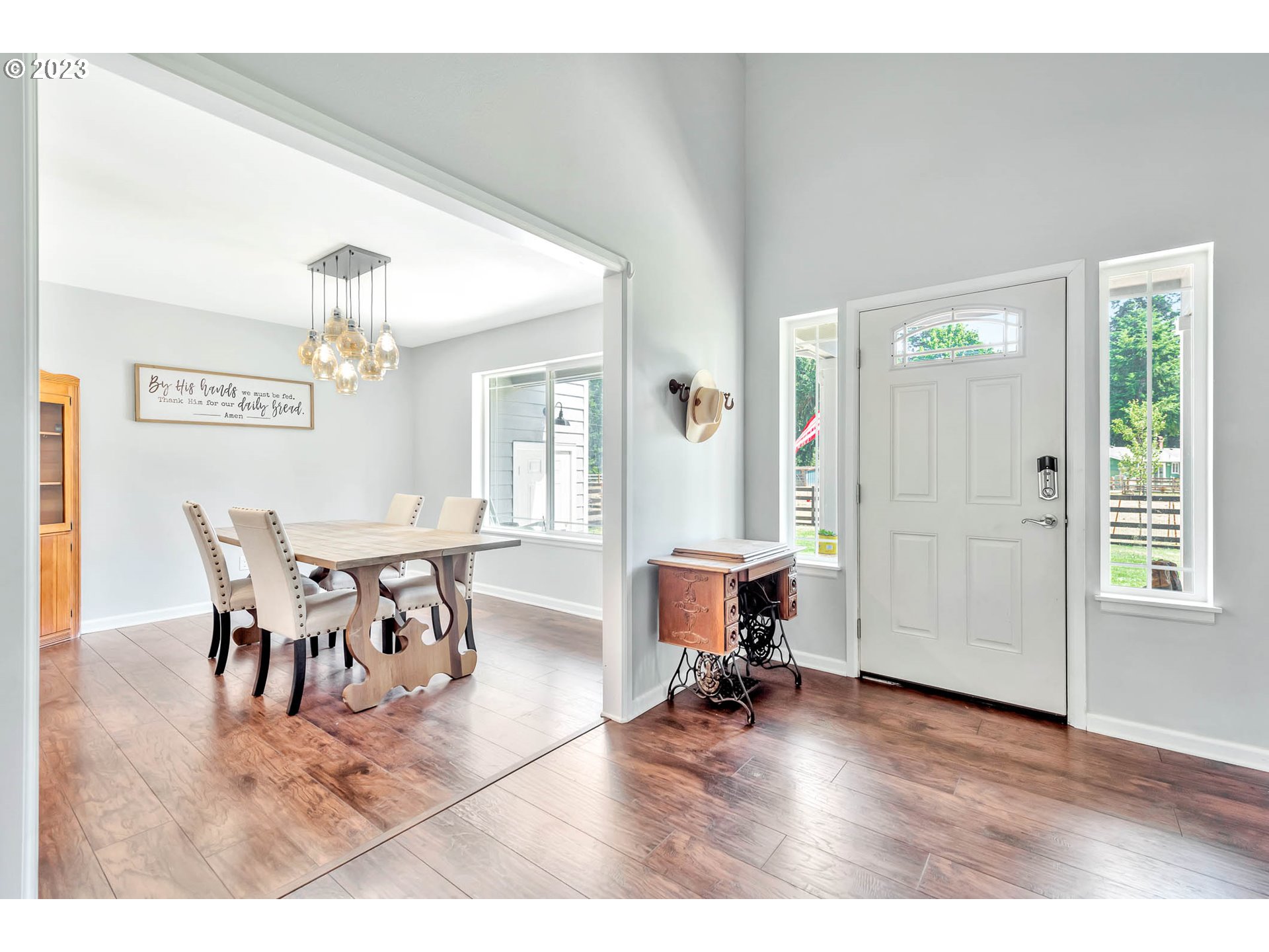 88750 Potter Lane Springfield, OR 97478 - Photo 5 of 43 a view of a dining room with furniture and wooden floor