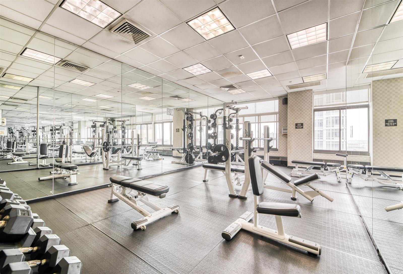 155 East 31st Street, Unit W8F Manhattan, NY 10016 - Photo 7 of 10 a view of a room with gym equipment