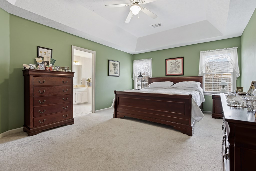 4827 Cedar Ridge Drive Columbus, GA 31909 - Photo 18 of 33 a bedroom with a bed and a dresser