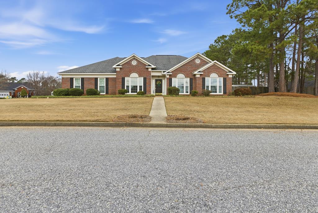 4827 Cedar Ridge Drive Columbus, GA 31909 - Photo 2 of 33 a front view of a house with a yard