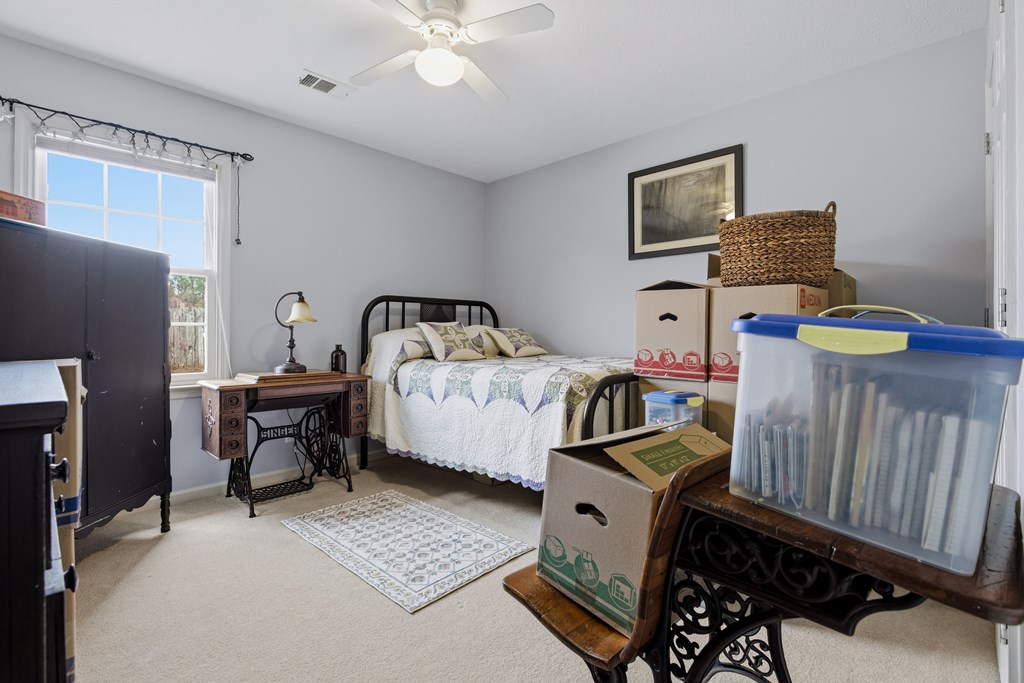 4827 Cedar Ridge Drive Columbus, GA 31909 - Photo 25 of 33 a bedroom with furniture and a window
