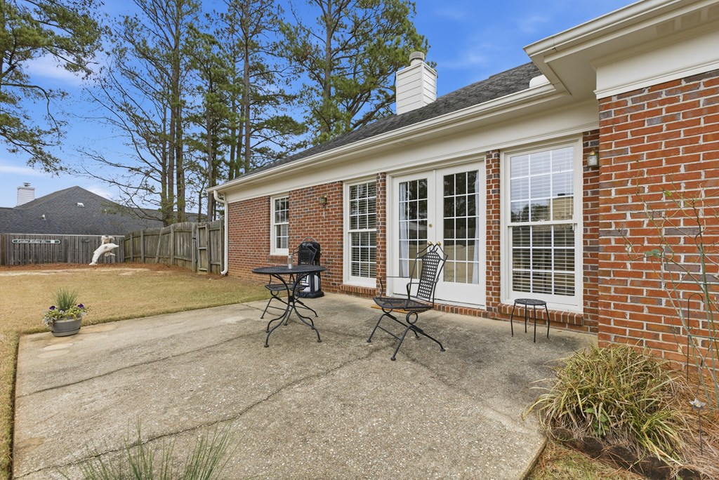 4827 Cedar Ridge Drive Columbus, GA 31909 - Photo 27 of 33 a view of a house with backyard and sitting area