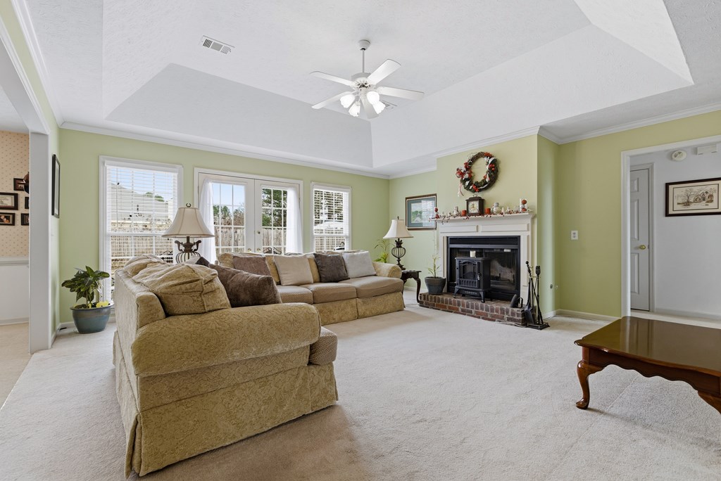 4827 Cedar Ridge Drive Columbus, GA 31909 - Photo 6 of 33 a living room with furniture and a fireplace