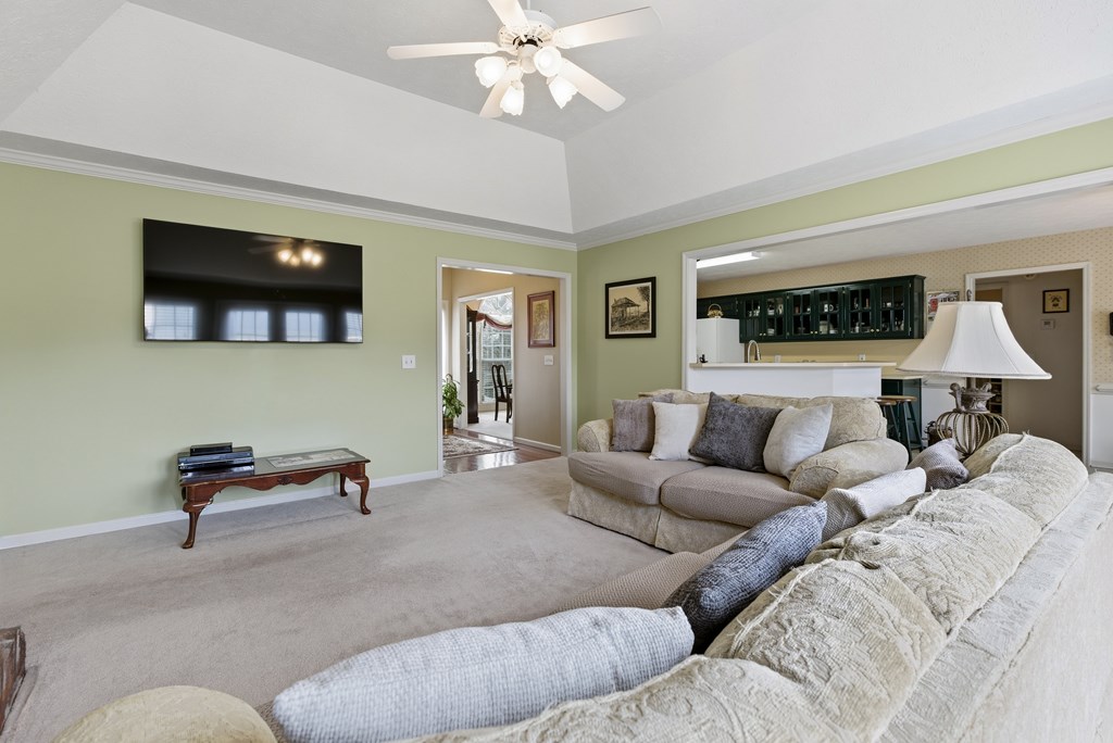 4827 Cedar Ridge Drive Columbus, GA 31909 - Photo 9 of 33 a living room with furniture and a flat screen tv