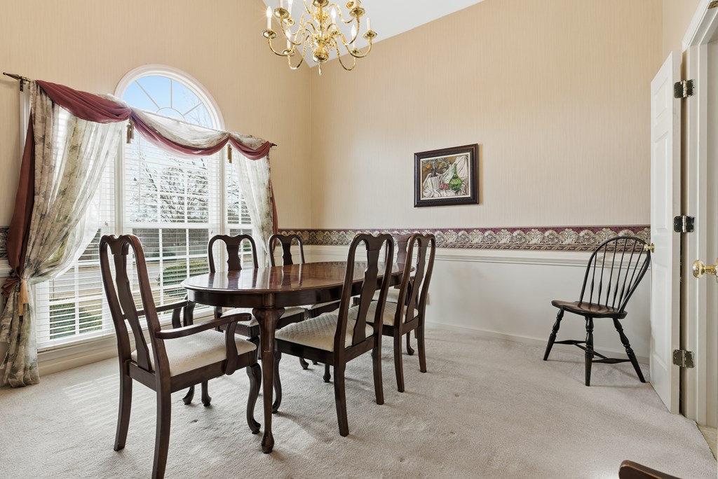 4827 Cedar Ridge Drive Columbus, GA 31909 - Photo 10 of 33 a view of a dining room with furniture window and wooden floor