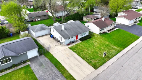 an aerial view of a house with garden