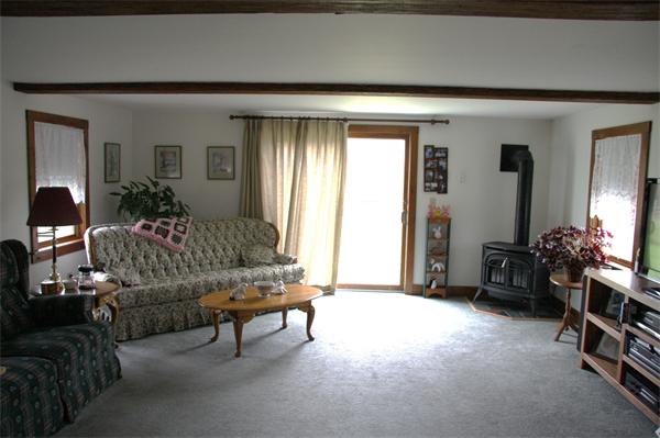 289 Hurricane Hill Road Mason, NH 03048 - Photo 14 of 30 a living room with furniture and a fireplace