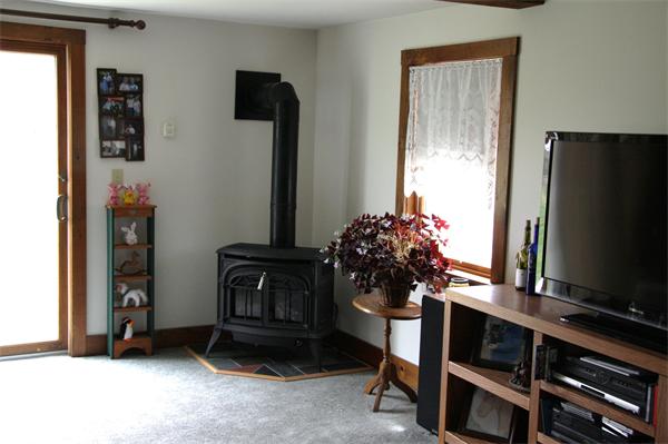 289 Hurricane Hill Road Mason, NH 03048 - Photo 16 of 30 a living room with furniture and a flat screen tv