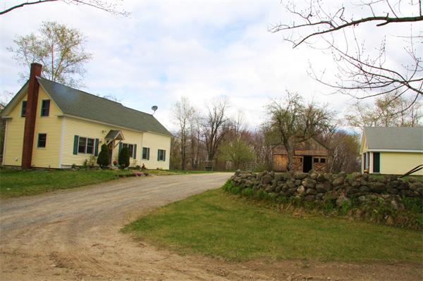 289 Hurricane Hill Road Mason, NH 03048 - Photo 2 of 30 a front view of a house with a yard and trees
