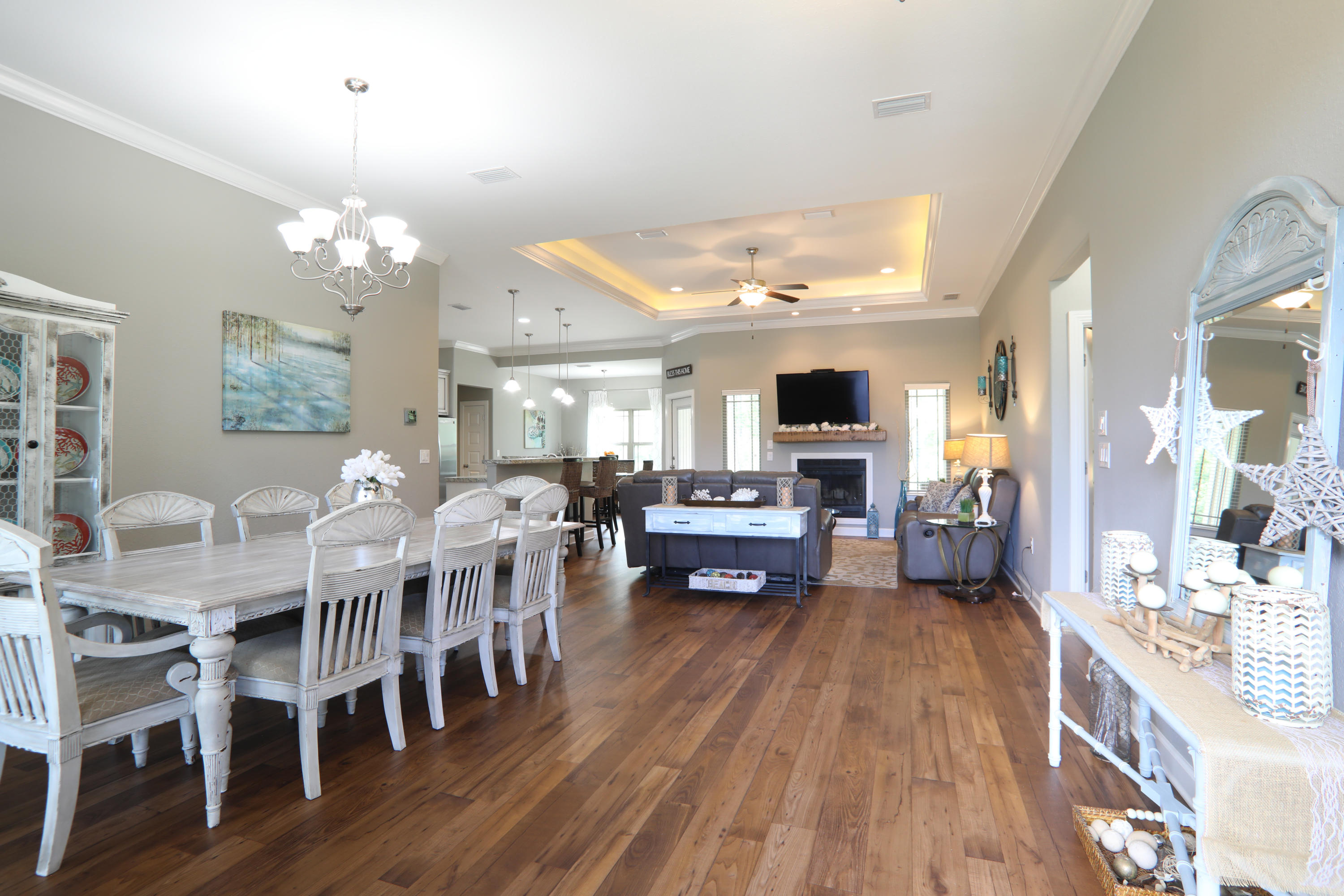 3037 Robinson Point Road Milton, FL 32583 - Photo 3 of 22 a view of a dining room with furniture window and wooden floor