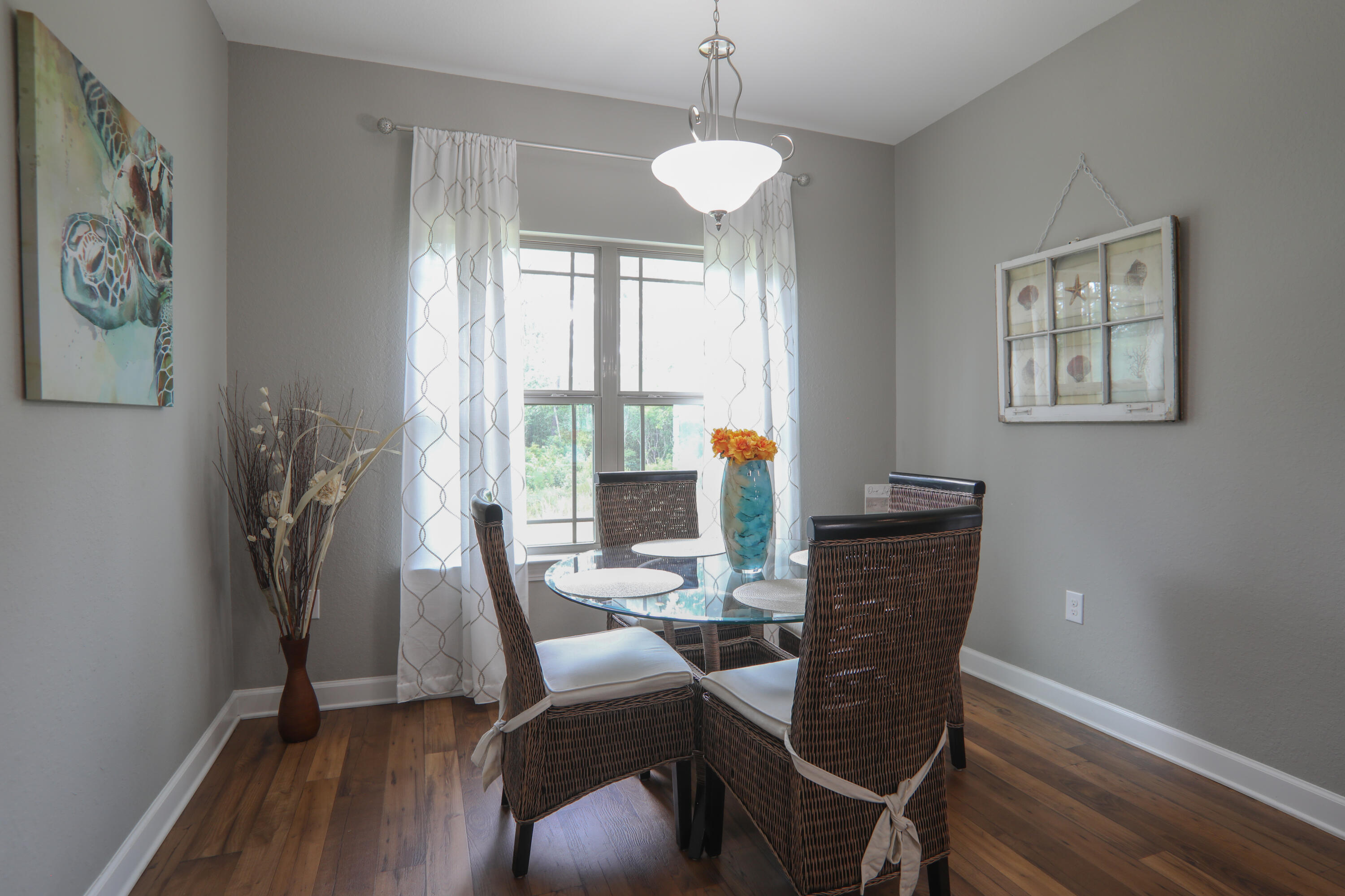 3037 Robinson Point Road Milton, FL 32583 - Photo 8 of 22 a view of a dining room with furniture window and outside view