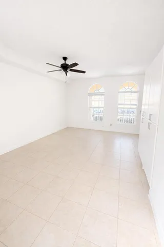 a bathroom with a sink a toilet and a shower