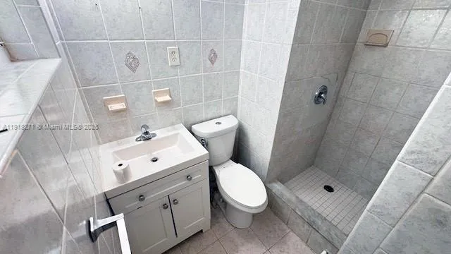 a view of a swimming pool with chairs in balcony