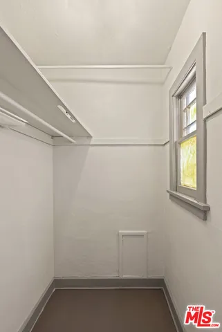 a view of a room with racks on the wall