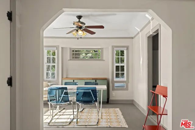 a view of a livingroom with furniture and window