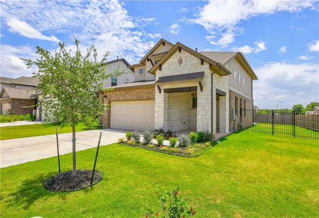a house view with a garden space
