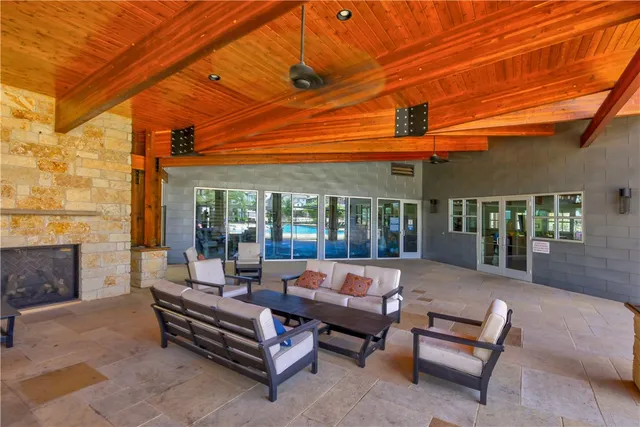 a outdoor space with patio furniture and garden view