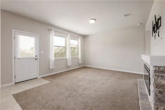 an empty room with windows