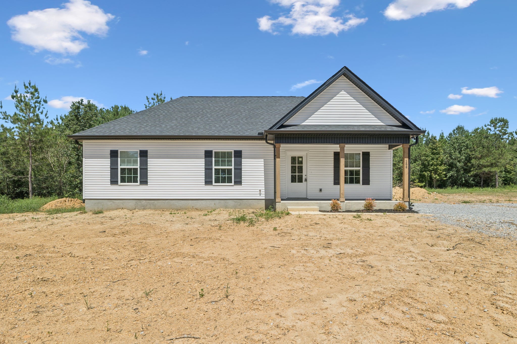 168 Old Brick Church Road Estill Springs, TN 37330 - Photo 3 of 5 a big house with wooden fence