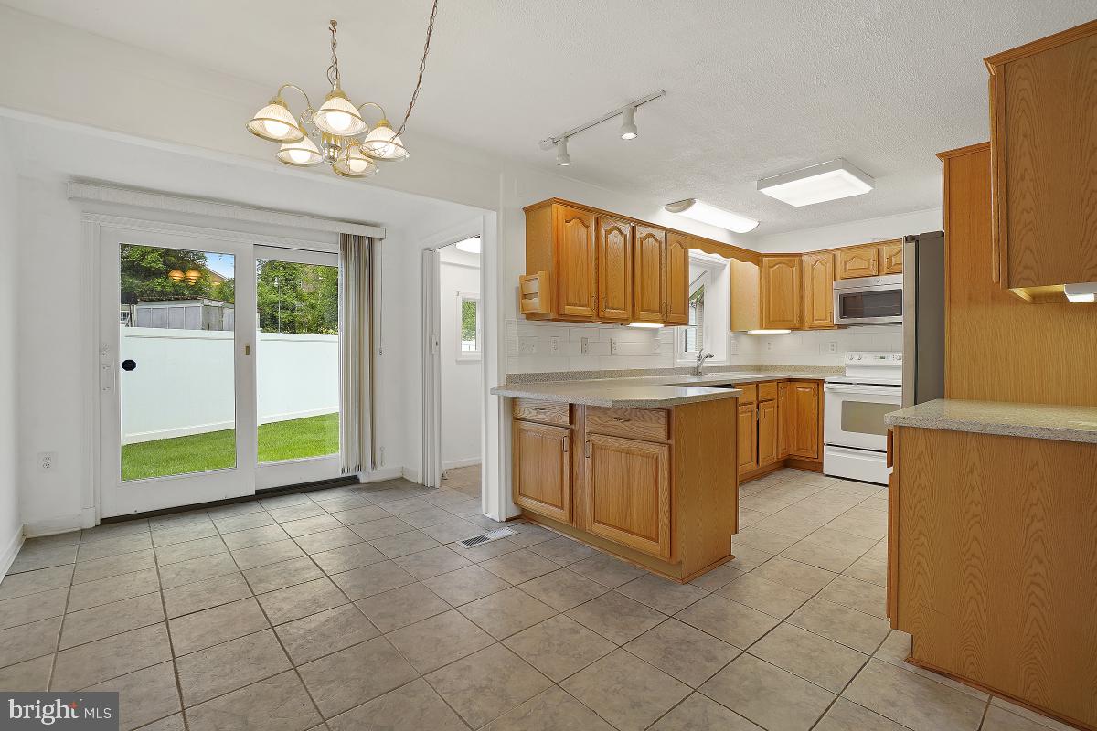 8112 Russell Road Alexandria, VA 22309 - Photo 5 of 32 Open Kitchen / Dining Area