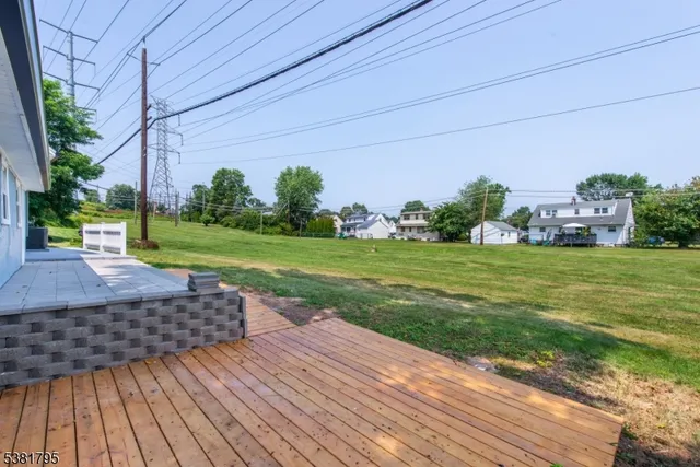 a view of a backyard with plants and garden
