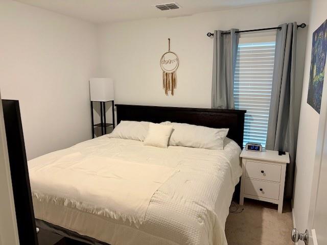 464 Reverie Way Ferris, TX 75125 - Photo 12 of 21 a large white bed in a white room