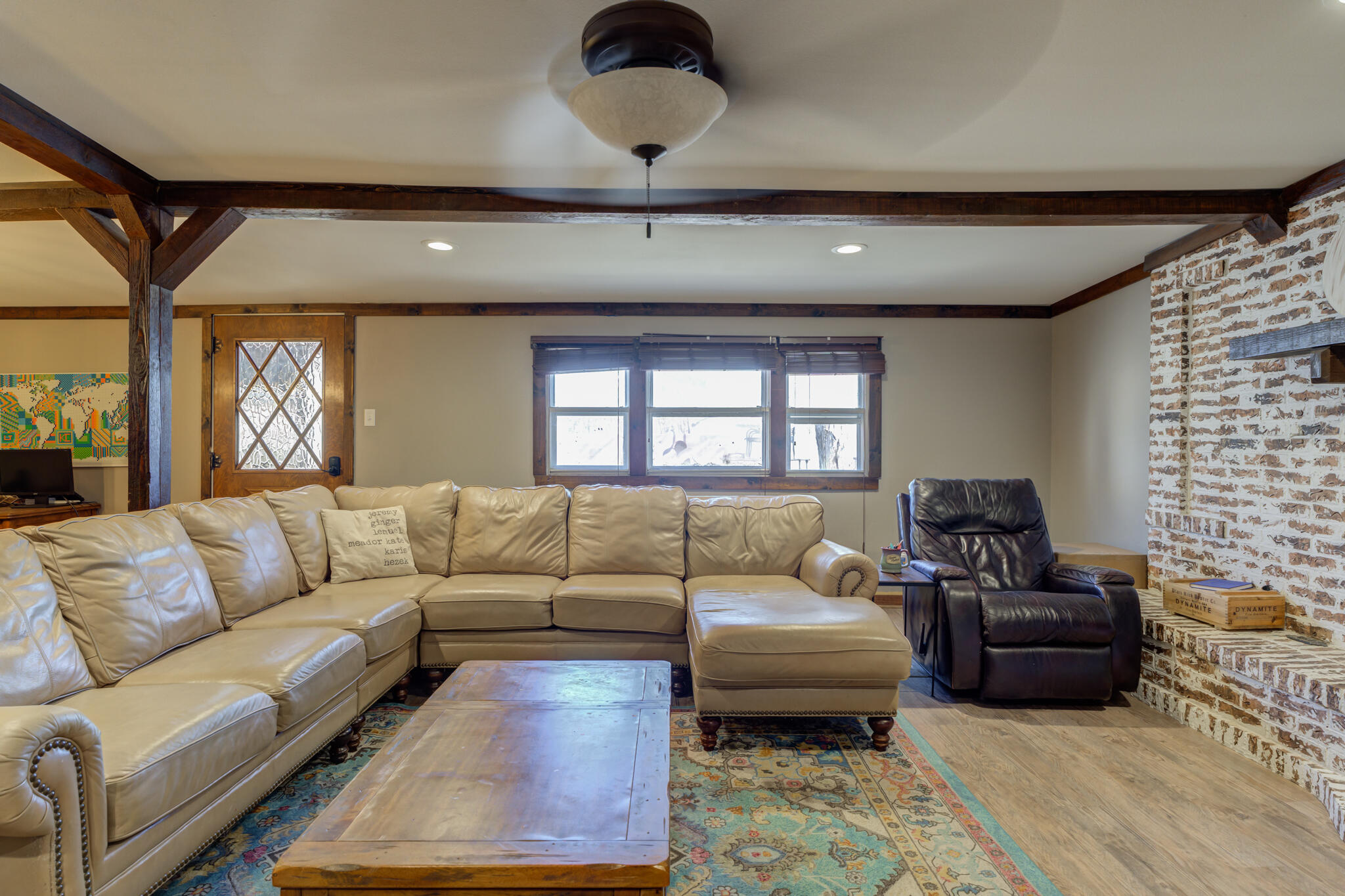 2741 County Road 3 Slaton, TX 79364 - Photo 21 of 51 a living room with furniture and a large window