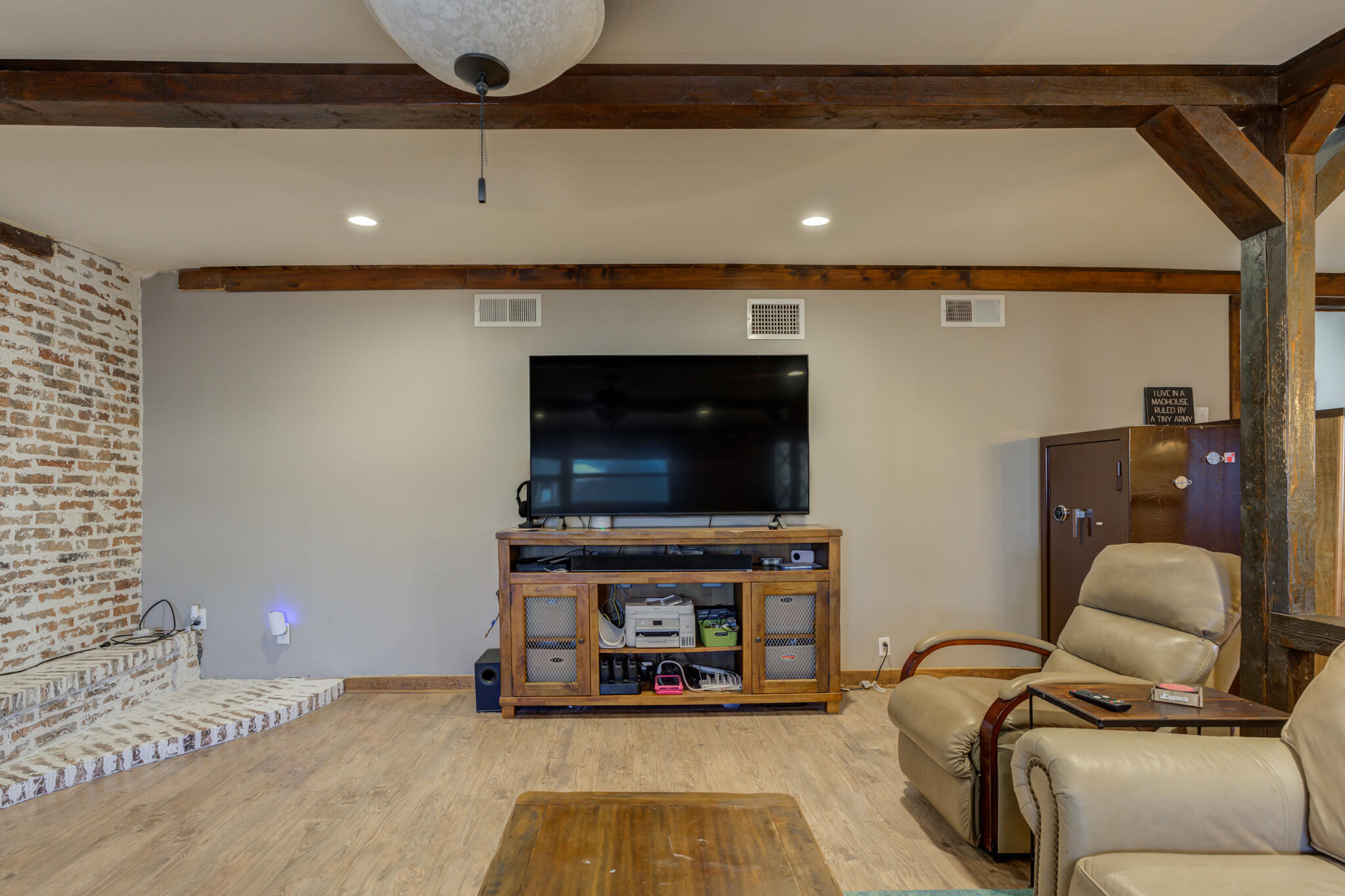 2741 County Road 3 Slaton, TX 79364 - Photo 25 of 51 a living room with furniture and a flat screen tv