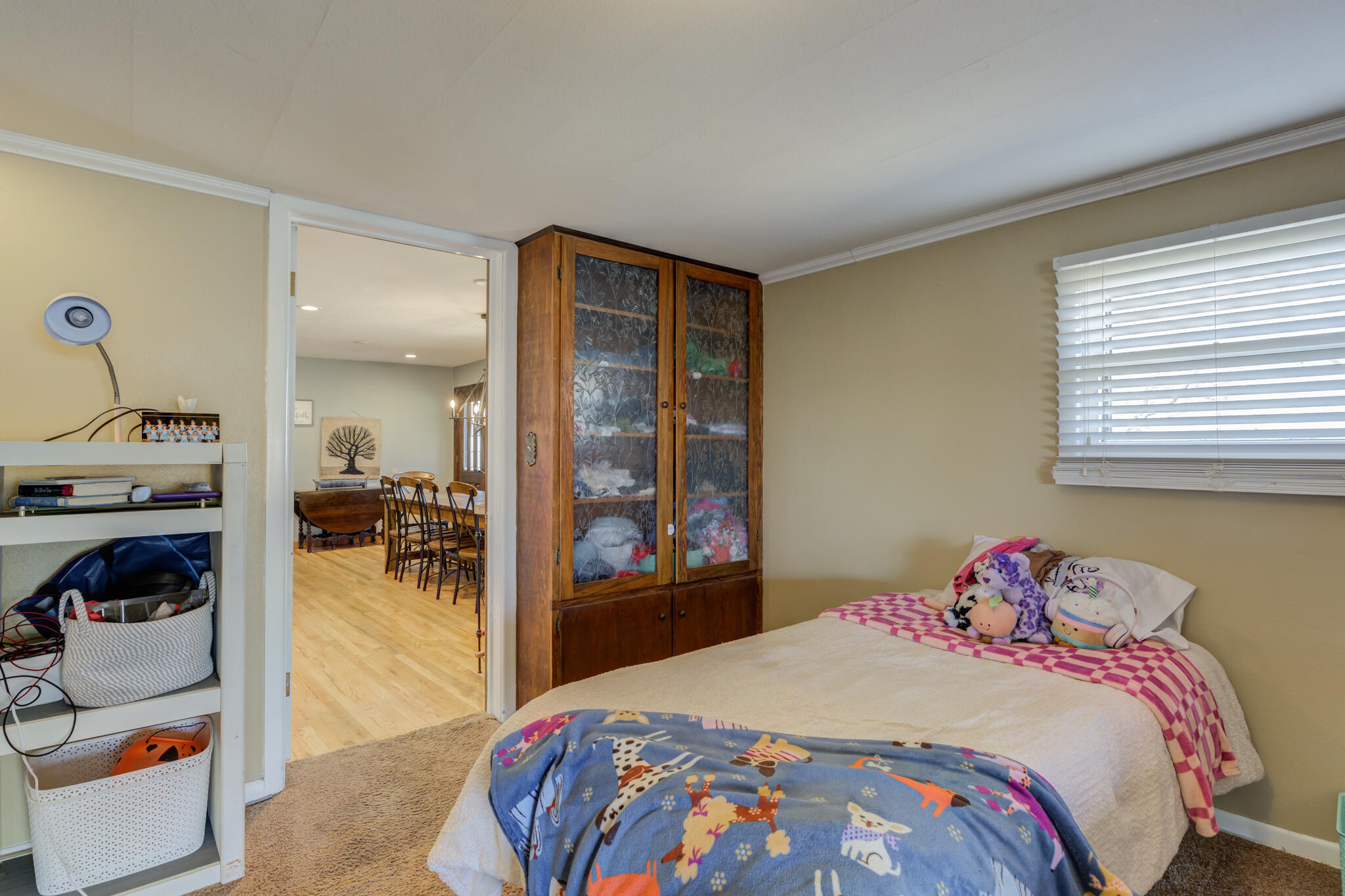 2741 County Road 3 Slaton, TX 79364 - Photo 29 of 51 a bedroom with a bed and a large window