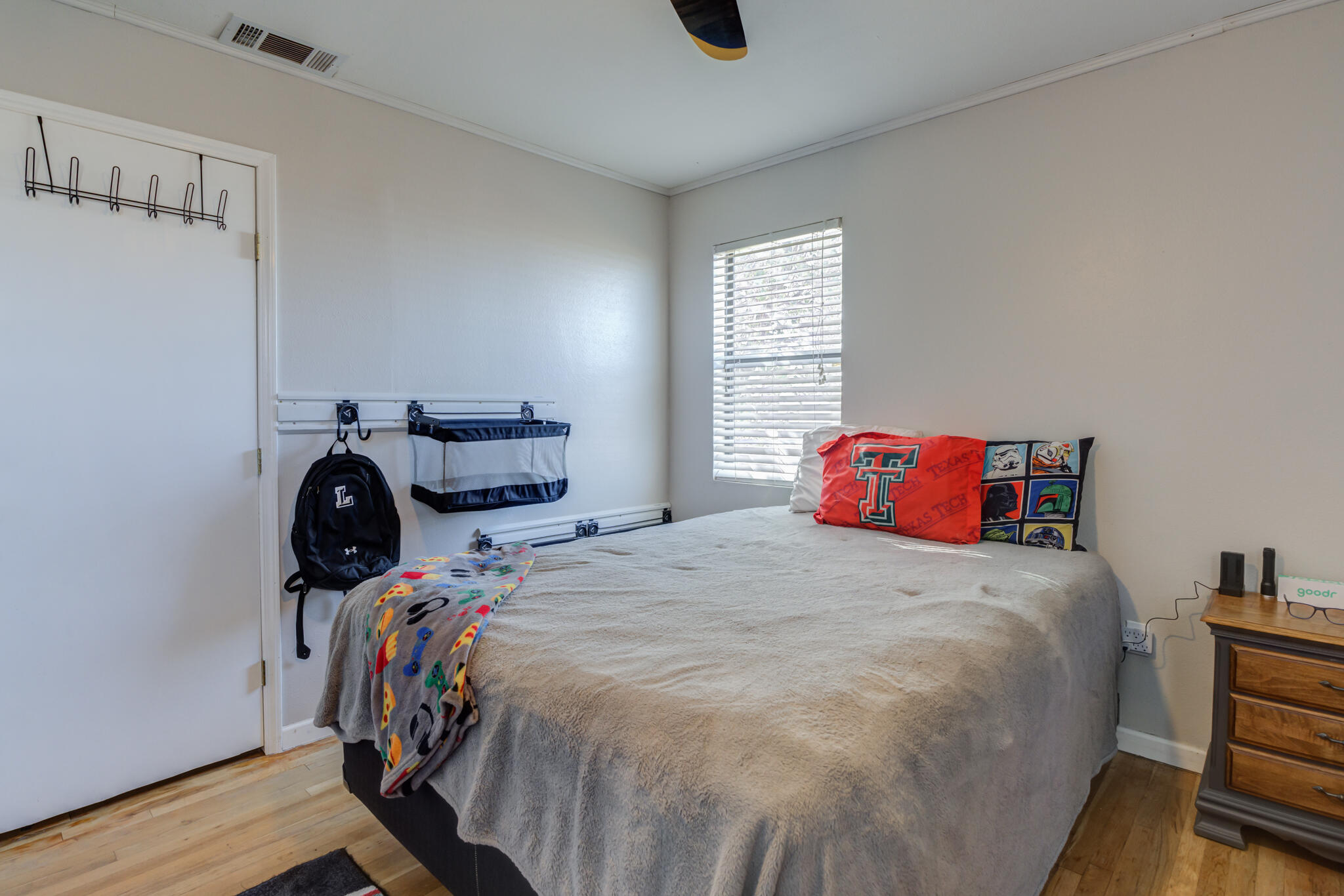 2741 County Road 3 Slaton, TX 79364 - Photo 31 of 51 a bedroom with a bed and window