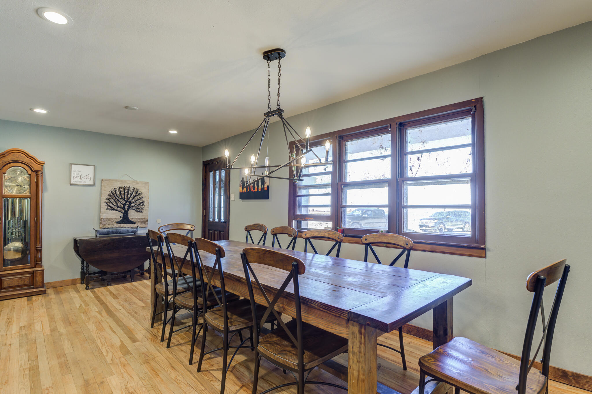 2741 County Road 3 Slaton, TX 79364 - Photo 4 of 51 a view of a dining room with furniture window and wooden floor