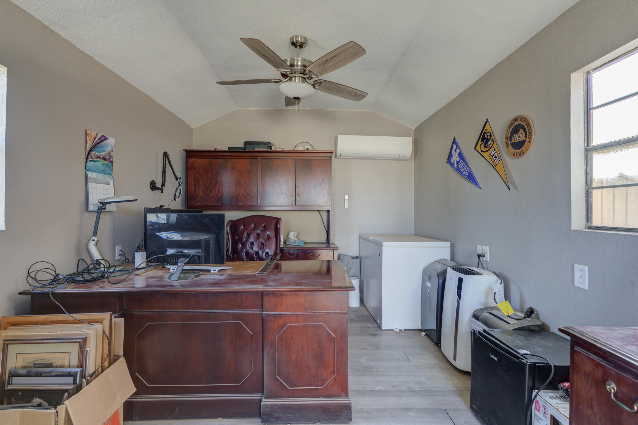 2741 County Road 3 Slaton, TX 79364 - Photo 45 of 51 a kitchen with furniture a sink and a window