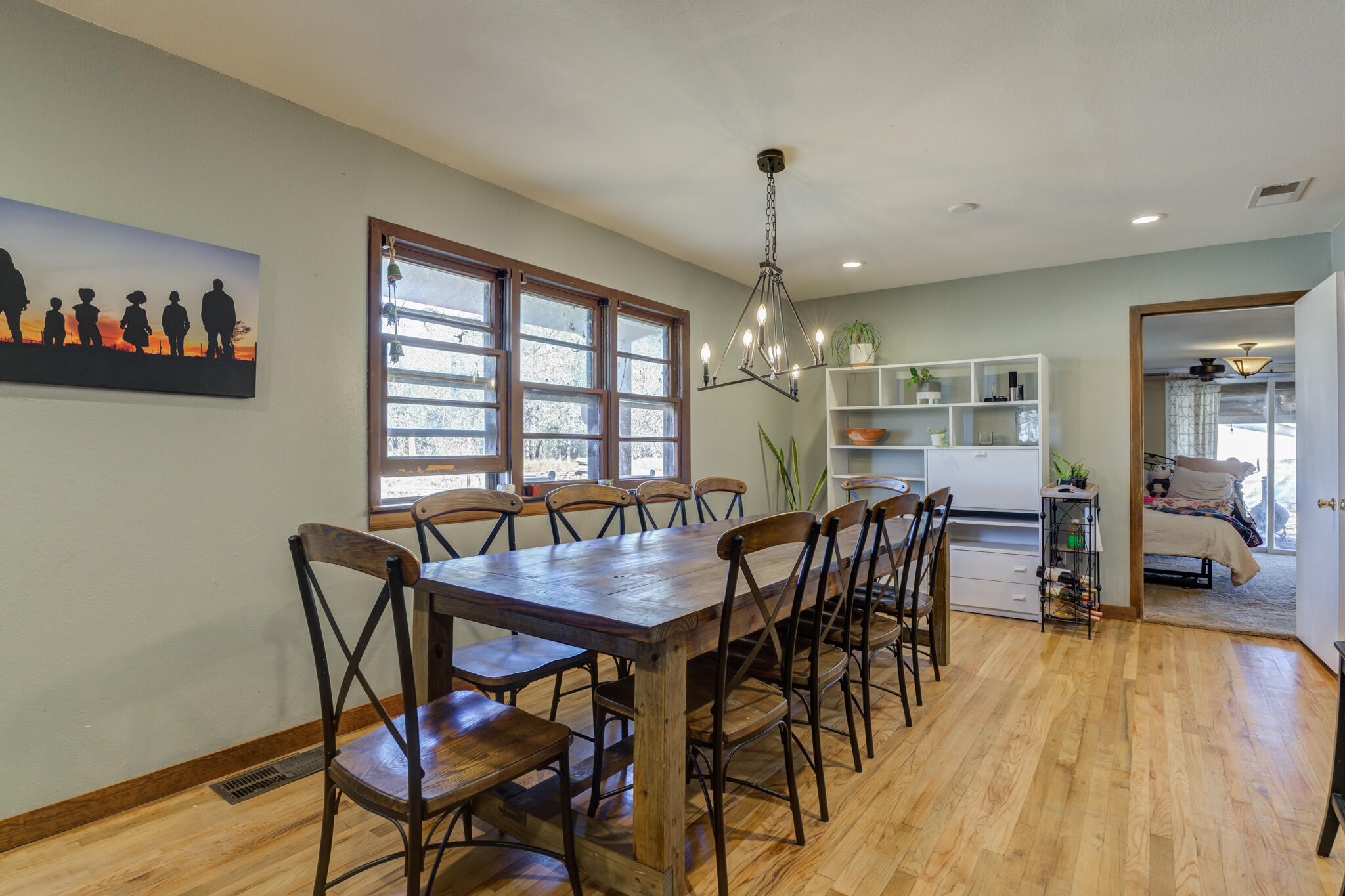 2741 County Road 3 Slaton, TX 79364 - Photo 5 of 51 a view of a dining room with furniture window and wooden floor