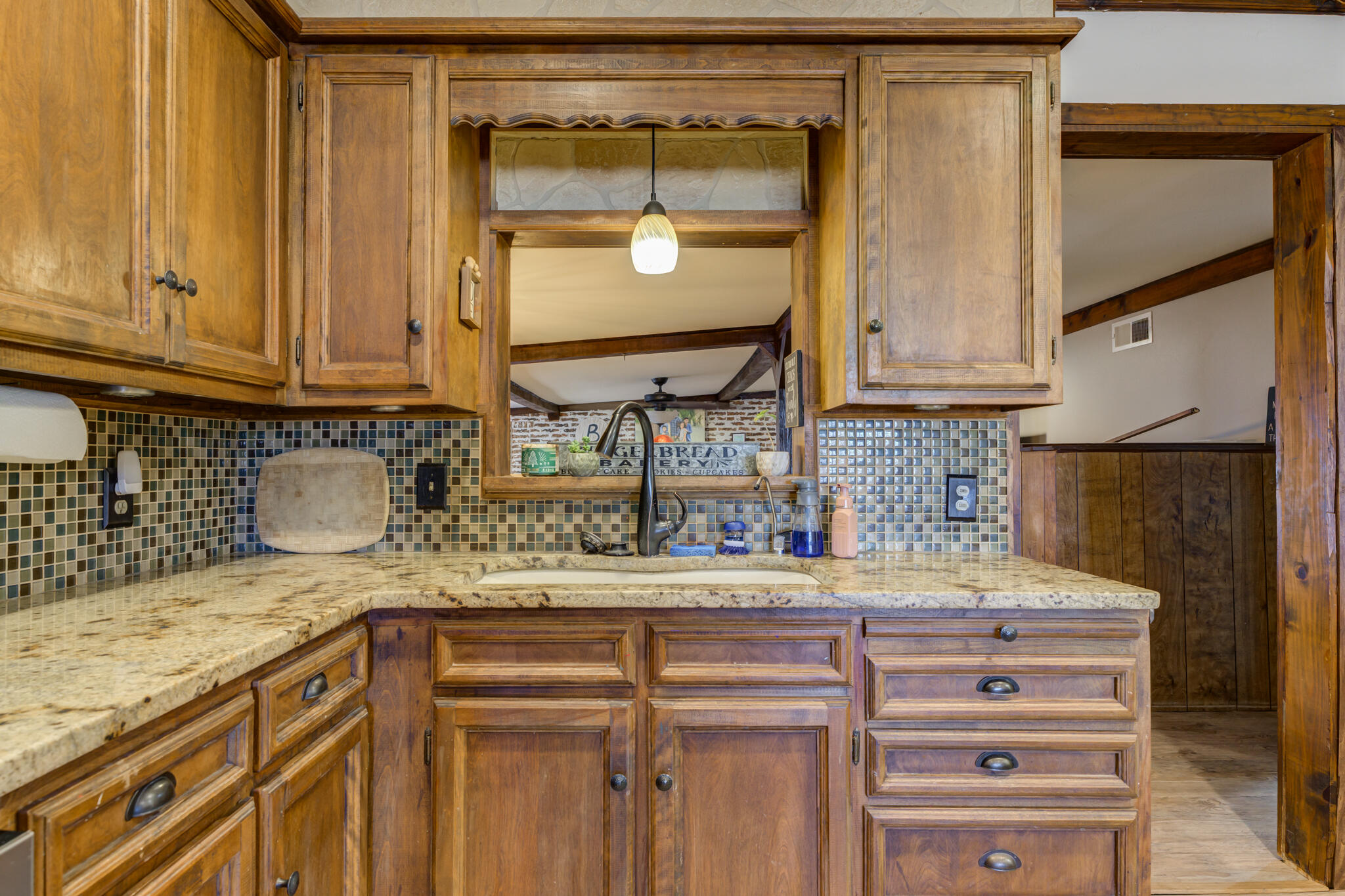 2741 County Road 3 Slaton, TX 79364 - Photo 10 of 51 a kitchen with a sink and cabinets