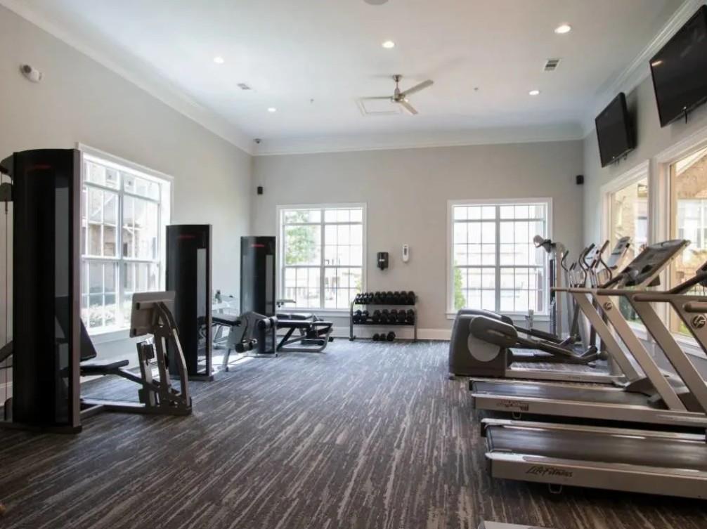 100 Crossing Boulevard, Unit 1518 McDonough, GA 30253 - Photo 15 of 26 a view of a livingroom with workspace and a window