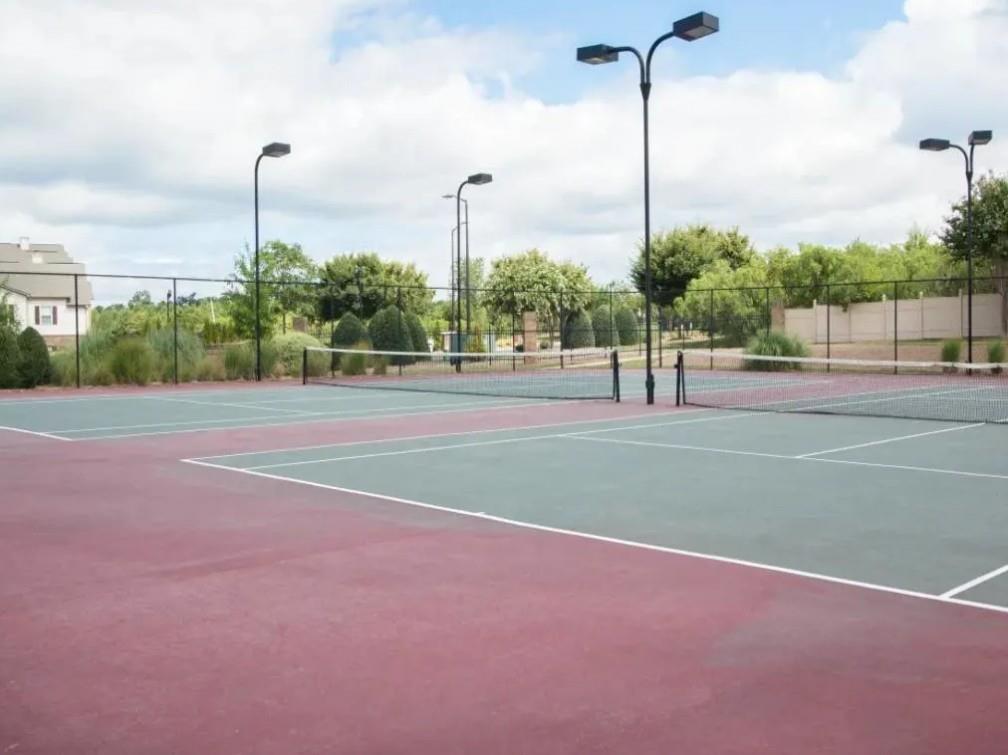 100 Crossing Boulevard, Unit 1518 McDonough, GA 30253 - Photo 22 of 26 a view of a tennis court