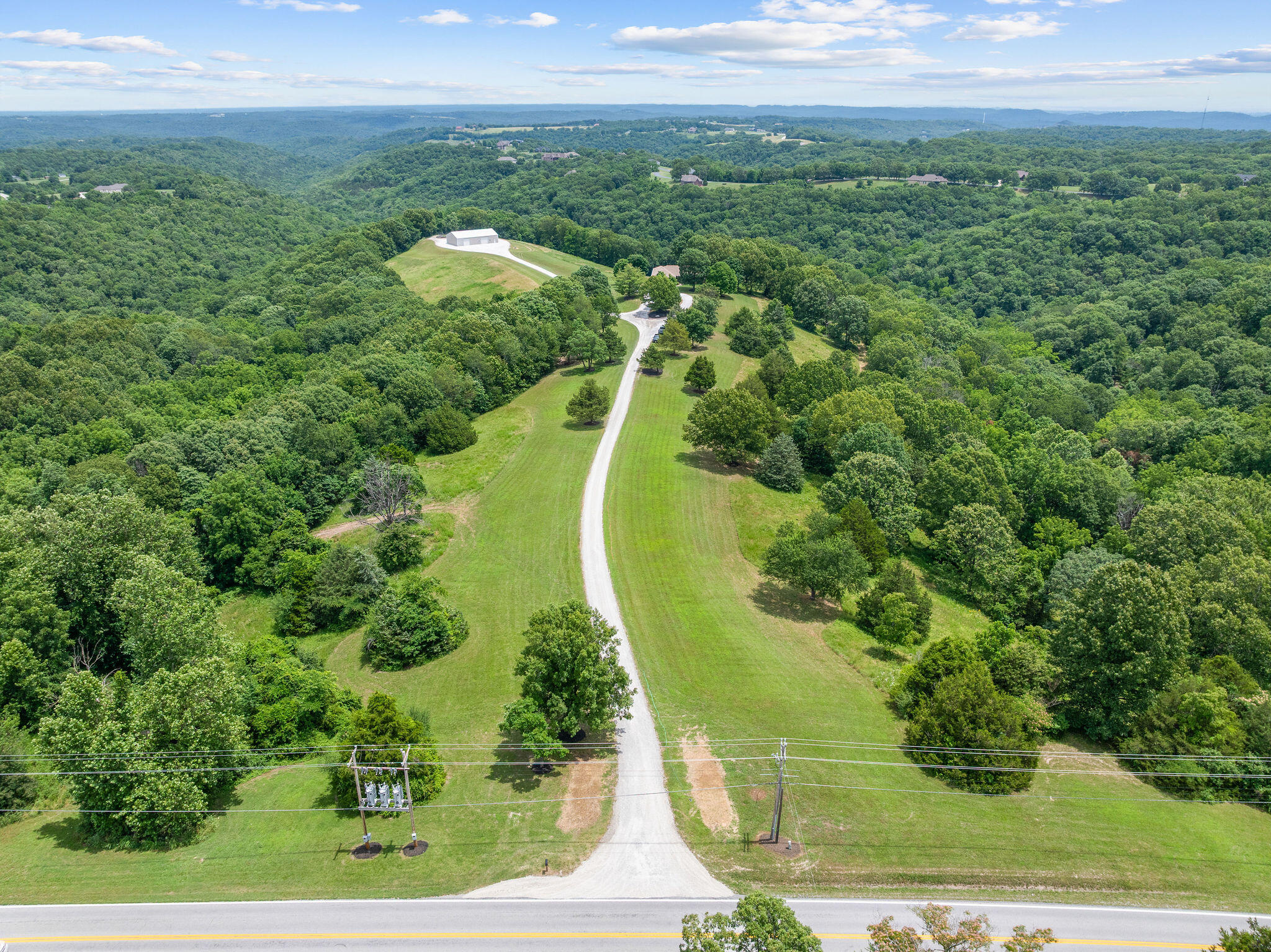 1155 Highway 160 Reeds Spring, MO 65737 - Photo 41 of 74 DJI_20250627125154_0043_D